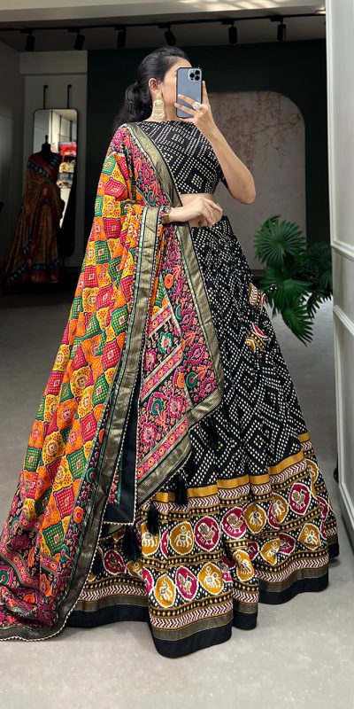 Angelic Black Color Tussar Silk With Heavy Tassels patola printed Lehenga Choli