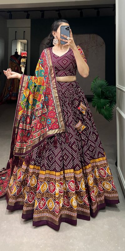 Angelic Wine Color Tussar Silk With Heavy Tassels patola printed Lehenga Choli
