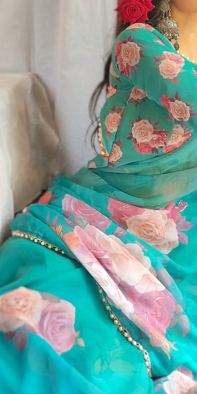 Graceful Green Color Georgette Printed pearl lace border Saree