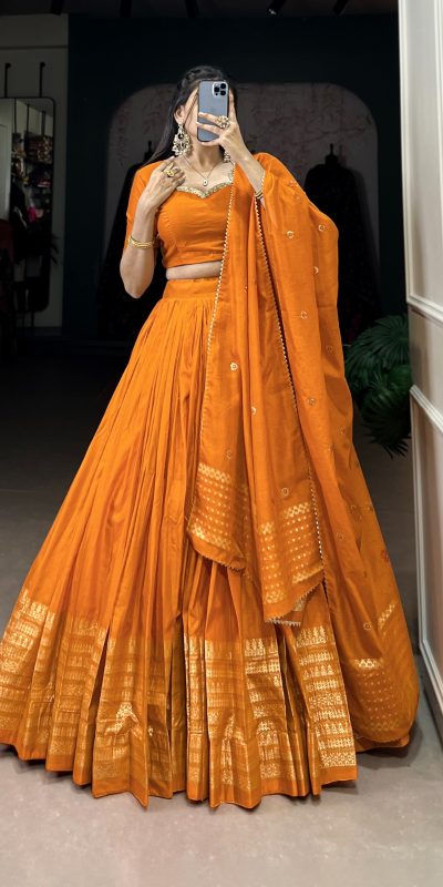 Pretty Orange Color Pure Chanderi Plain With Zari Weaving Work Border Lehenga Choli