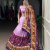 LNB 1734 Lavender Tasar Silk Gamthi Work With MirrorWork Lehenga Choli Introductory Price ₹2999. Delivery 4-6 Working Days. Shop now. | Lehenga, Bollywood Lehenga, Creative Lehenga, Designer Lehenga, Embroidered Lehenga, Party Wear Lehenga