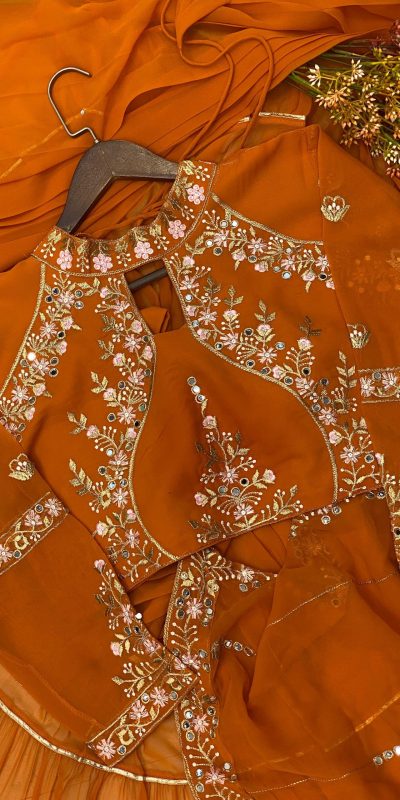 BE 280 Rust Georgette Lehenga Saree Perfect for Wedding, Party, Cultural Events, Housewarming, Ganesh Chaturthi . Affordable Price ₹2399. Delivery 4- | Lehenga, Bollywood Lehenga, Creative Lehenga, Designer Lehenga, Embroidered Lehenga, Party Wear Lehenga