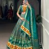 LNB 1734 Teal Tasar Silk Gamthi Work With MirrorWork Lehenga Choli Introductory Price ₹2999. Delivery 4-6 Working Days. Shop now. | Lehenga, Bollywood Lehenga, Creative Lehenga, Designer Lehenga, Embroidered Lehenga, Party Wear Lehenga