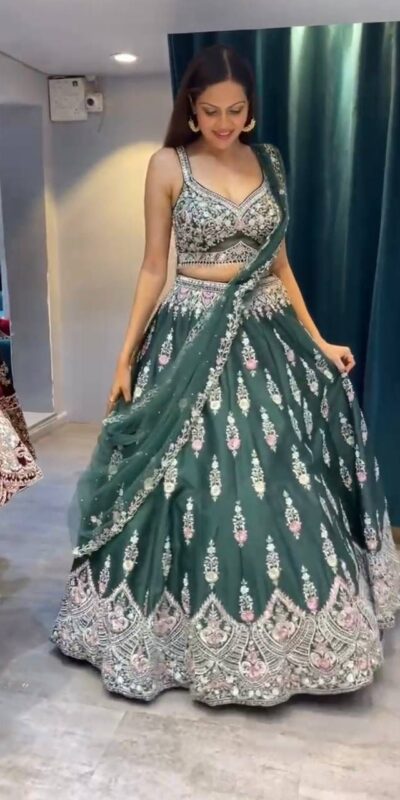 Green Fuax Georgette Cut Work Lehenga Choli