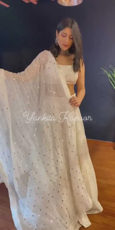 yankita-kapoor-stylish-white-color-wedding-bridal-lehenga-choli
