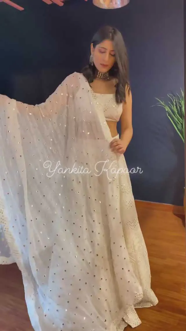 yankita-kapoor-stylish-white-color-wedding-bridal-lehenga-choli