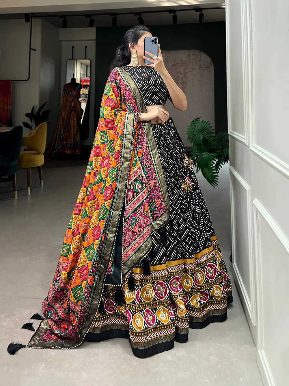 Angelic Black Color Tussar Silk With Heavy Tassels patola printed Lehenga Choli