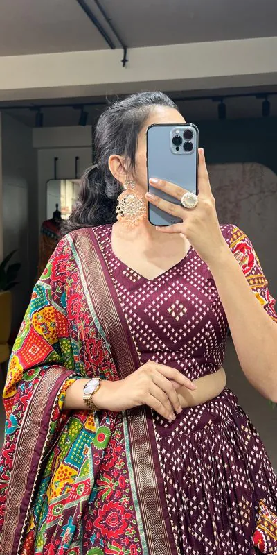 Angelic Wine Color Tussar Silk With Heavy Tassels patola printed Lehenga Choli