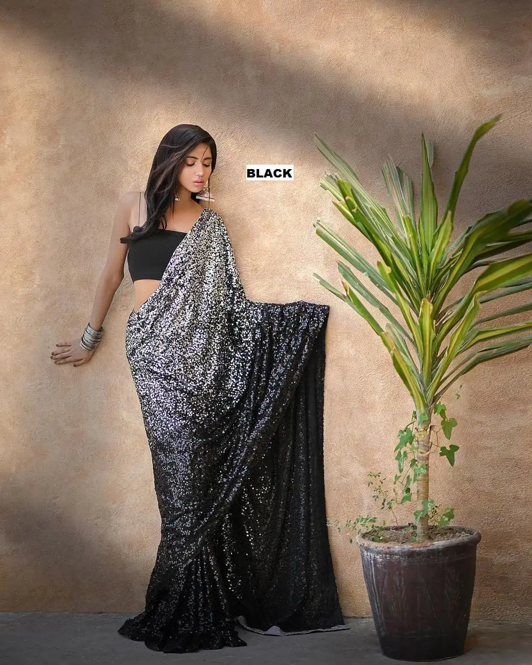 Entrancing Black Color Heavy 60 Gram Georgette Sequins Saree