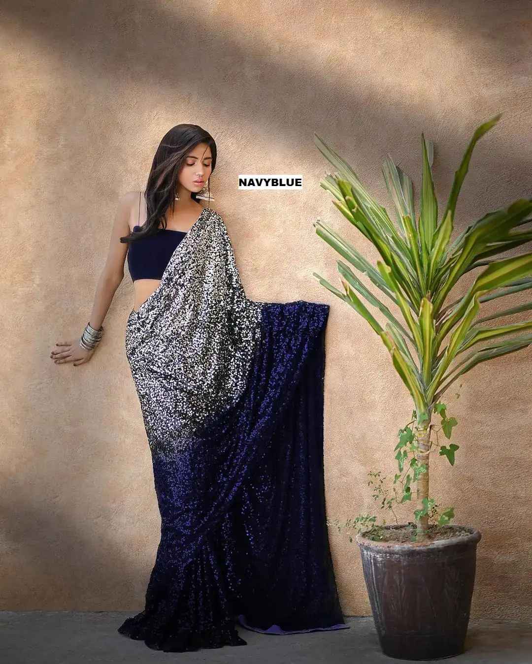 Entrancing Navy Blue Color Heavy 60 Gram Georgette Sequins Saree