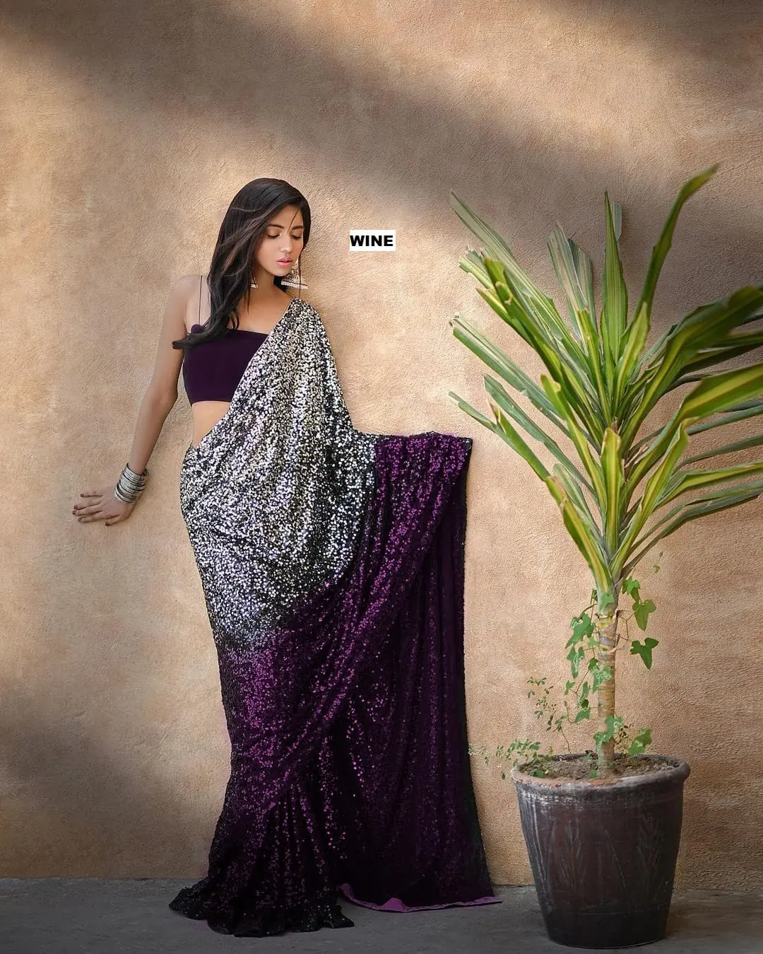 Entrancing Wine Color Heavy 60 Gram Georgette Sequins Saree