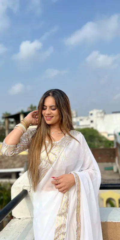 Glamorous White Color Georgette Heavy Sequence Work Saree