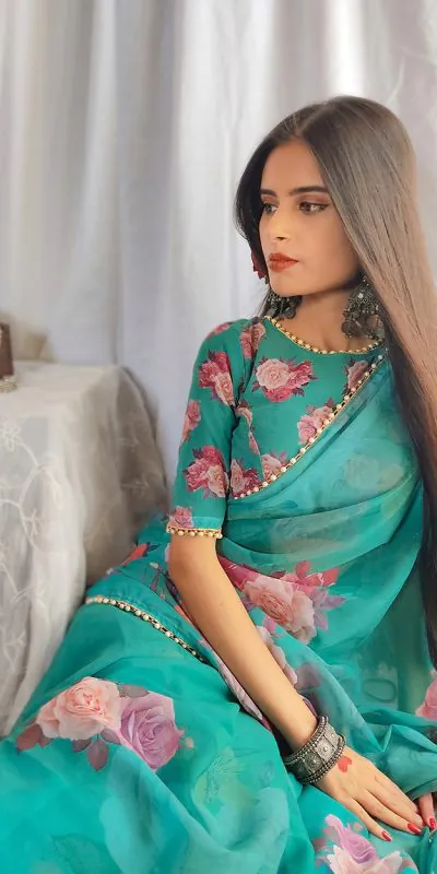 Graceful Green Color Georgette Printed pearl lace border Saree