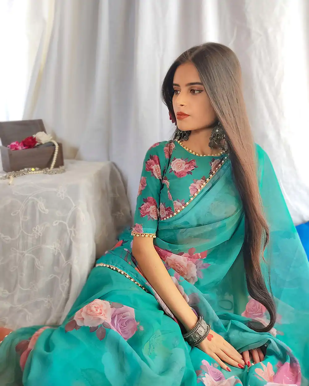 Graceful Green Color Georgette Printed pearl lace border Saree