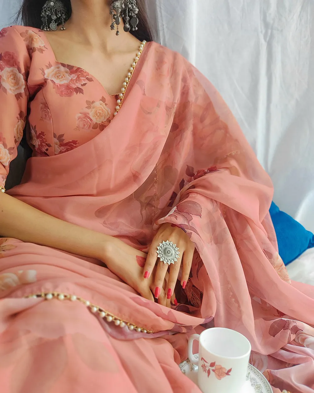 Graceful Orange Color Georgette Printed pearl lace border Saree