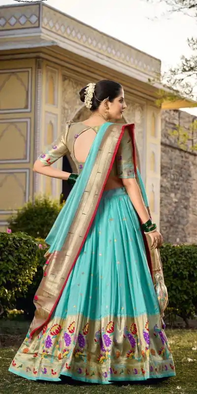 Artful Sky Blue Color Jacquard Silk Weaving Zari Lehenga Choli