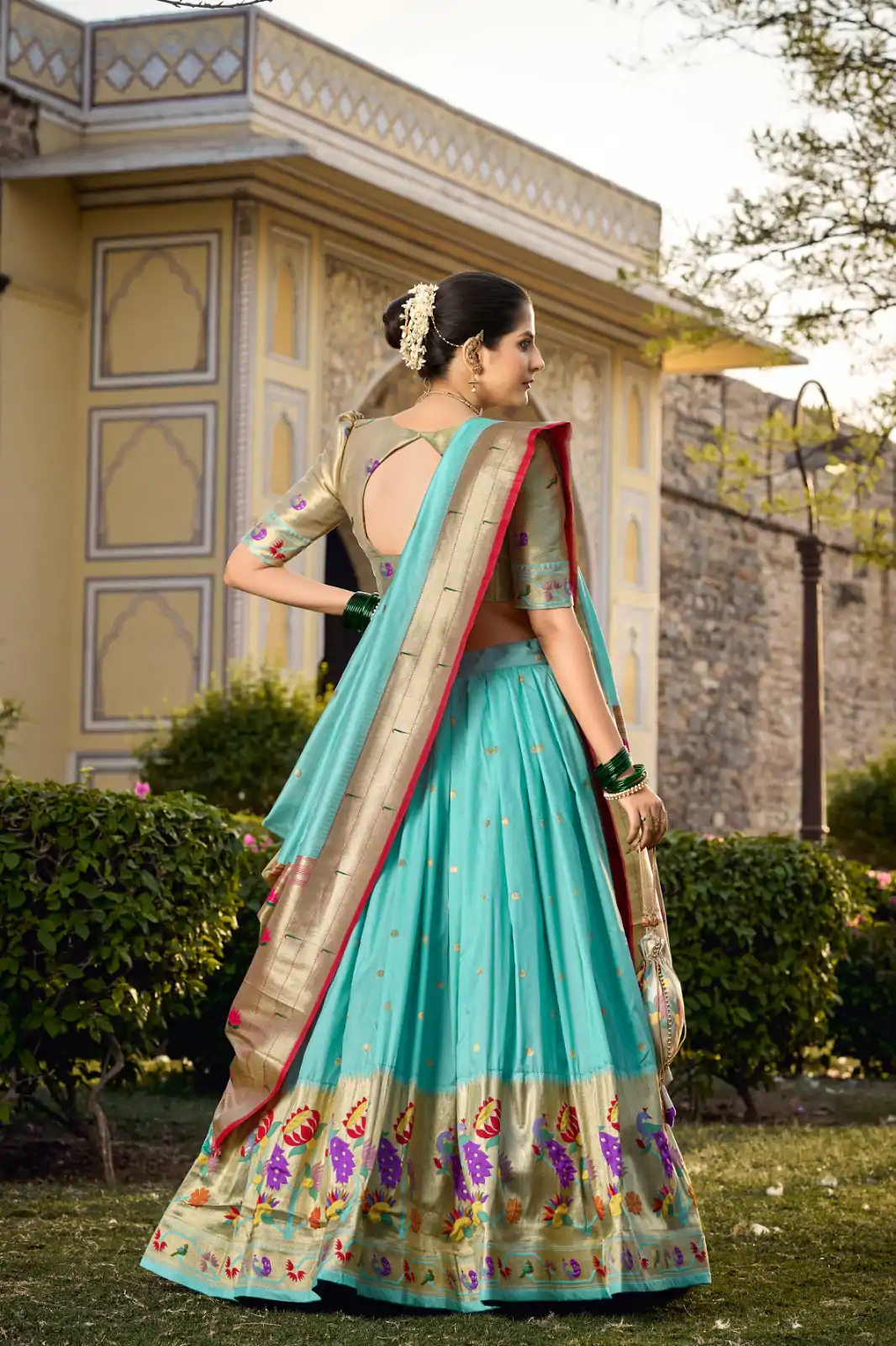 Artful Sky Blue Color Jacquard Silk Weaving Zari Lehenga Choli