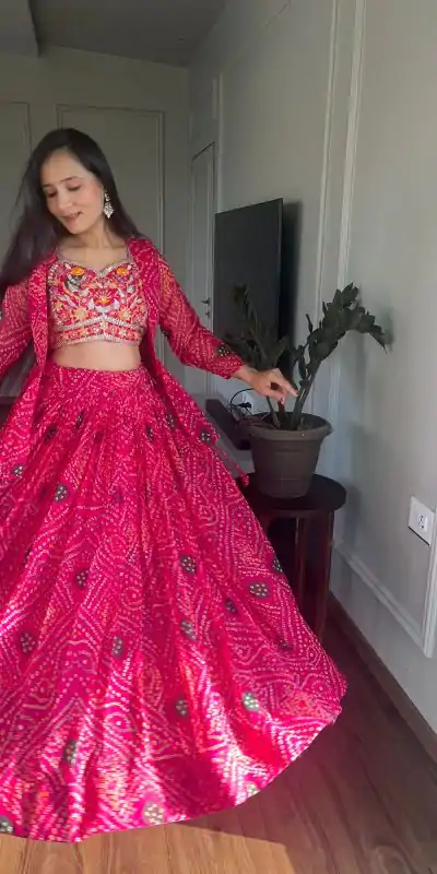 Commitment Pink Color Pure Bandhrej Heavy Embroidery Sequence Lehenga Choli