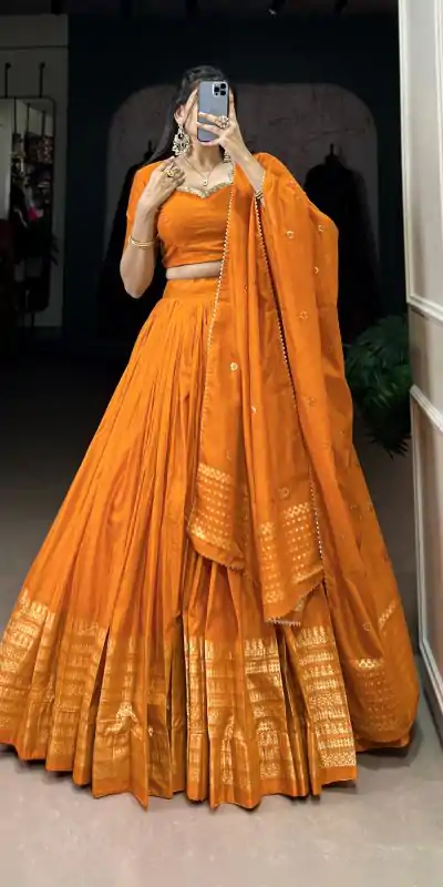 Pretty Orange Color Pure Chanderi Plain With Zari Weaving Work Border Lehenga Choli