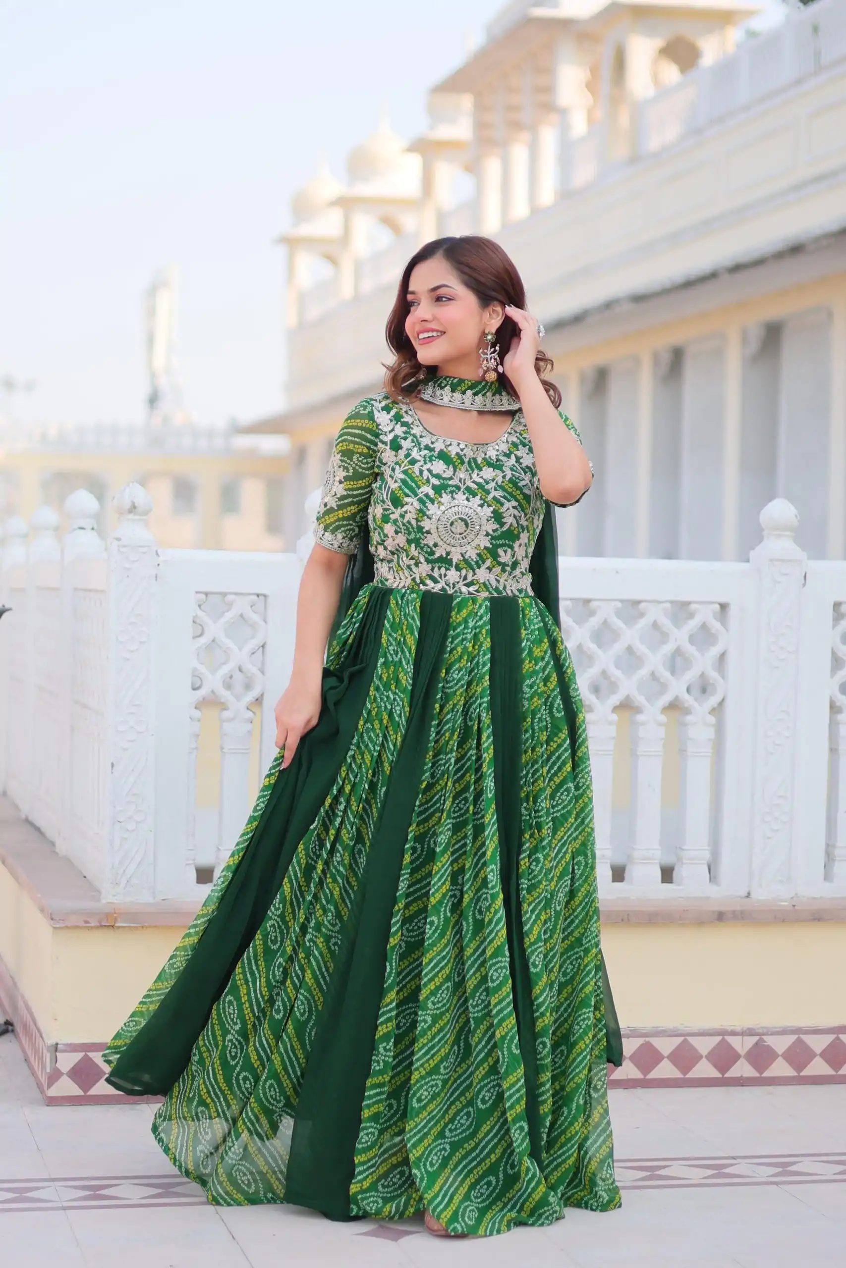 Stylist Green Color Bandhej Fox Georgette Sequence Work Gown