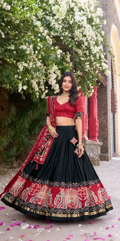 Superb Black Color Tushar Silk Patola Printed Lehenga Choli