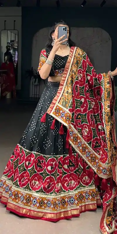 LNB 1734 Black Tasar Silk Gamthi Work With MirrorWork Lehenga Choli Introductory Price ₹2999. Delivery 4-6 Working Days. Shop now. | Lehenga, Bollywood Lehenga, Creative Lehenga, Designer Lehenga, Embroidered Lehenga, Party Wear Lehenga