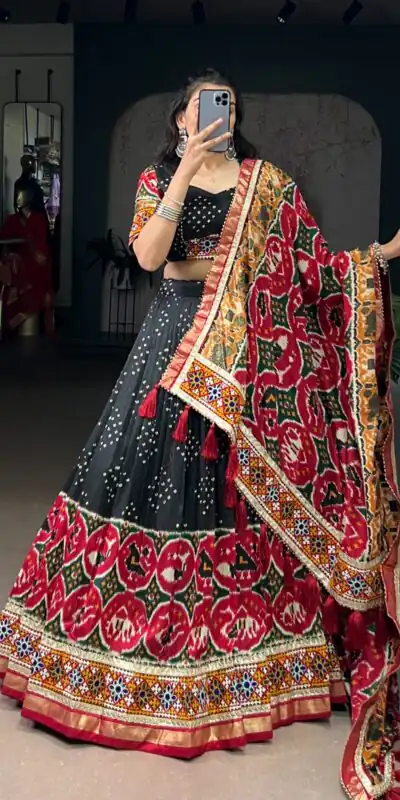 LNB 1734 Black Tasar Silk Gamthi Work With MirrorWork Lehenga Choli Introductory Price ₹2999. Delivery 4-6 Working Days. Shop now. | Lehenga, Bollywood Lehenga, Creative Lehenga, Designer Lehenga, Embroidered Lehenga, Party Wear Lehenga
