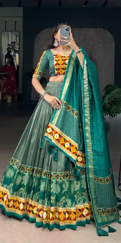 LNB 1734 Teal Tasar Silk Gamthi Work With MirrorWork Lehenga Choli Introductory Price ₹2999. Delivery 4-6 Working Days. Shop now. | Lehenga, Bollywood Lehenga, Creative Lehenga, Designer Lehenga, Embroidered Lehenga, Party Wear Lehenga