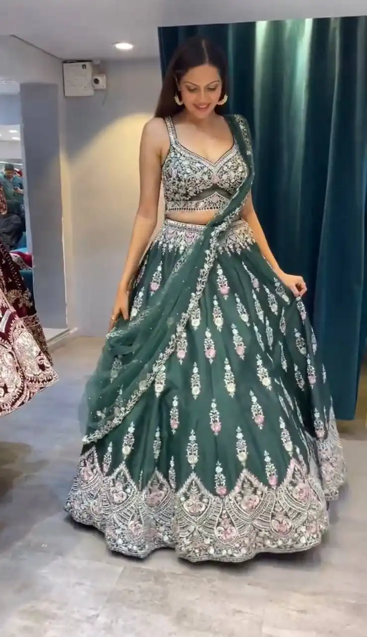 Green Fuax Georgette Cut Work Lehenga Choli