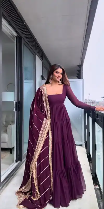 KD 1539 Wine Faux Georgette Ruffle Style Gown. Wedding, Party, Festive, Events Grab it for ₹2099. Delivery 4-6 Working Days. Shop now. | Gowns, Bollywood Gowns, Creative Gowns, Designer Gowns, Embroidered Gowns, Party Wear Gowns