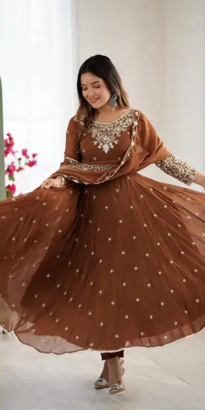 ZF 5012 Brown Blooming Faux Gown with Embroidery Work. Wedding, Party, Festive, Events Grab it for ₹2149. Delivery 4-6 Working Days. Shop now. | Lehenga, Bollywood Lehenga, Creative Lehenga, Designer Lehenga, Embroidered Lehenga, Party Wear Lehenga