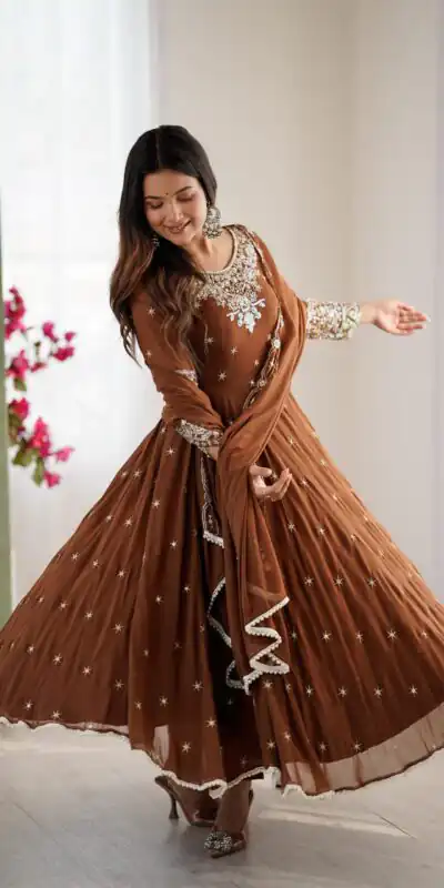 ZF 5012 Brown Blooming Faux Gown with Embroidery Work. Wedding, Party, Festive, Events Grab it for ₹2149. Delivery 4-6 Working Days. Shop now. | Lehenga, Bollywood Lehenga, Creative Lehenga, Designer Lehenga, Embroidered Lehenga, Party Wear Lehenga