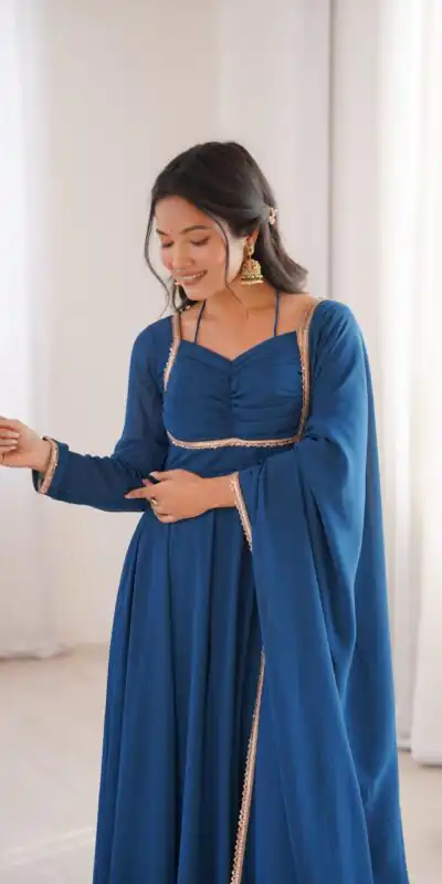 KB 291 Teal Color Fox Blooming Georgette Gown with Lace Work. Affordable Price ₹1899. Delivery 4-6 Working Days. Shop now. | Gowns, Bollywood Gowns, Creative Gowns, Designer Gowns, Embroidered Gowns, Party Wear Gowns