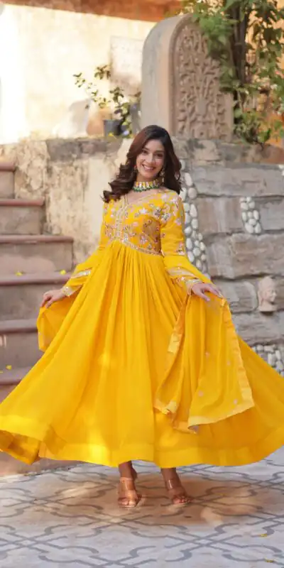 KA 1147 Yellow Faux Blooming Gown with Embroidery Work & Zari Work. Affordable Price ₹2049. Delivery 4-6 Working Days. Shop now. | Gowns, Bollywood Gowns, Creative Gowns, Designer Gowns, Embroidered Gowns, Party Wear Gowns