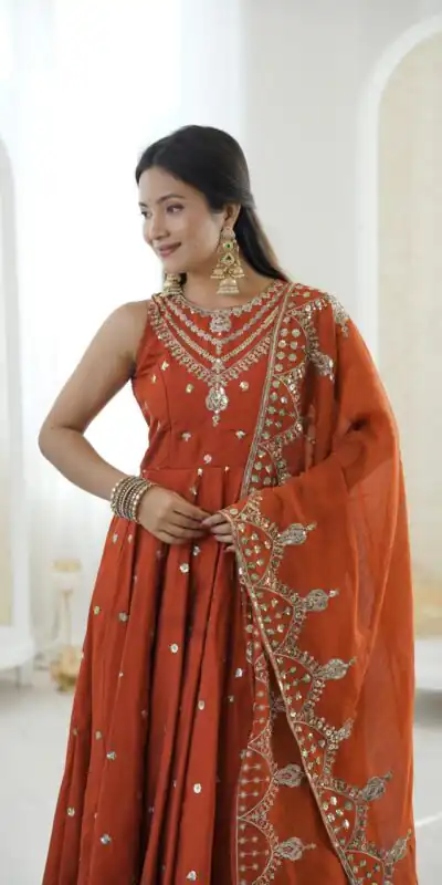 JF 038 Rust Roman Silk Gown with Embroidery Work. Wedding, Party, Festive, Events, Navratri, Exclusive Offer ₹2149. Delivery 4-6 Working Days. Shop now. | Gowns, Bollywood Gowns, Creative Gowns, Designer Gowns, Embroidered Gowns, Party Wear Gowns