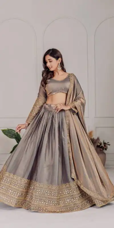 MT 1039 Grey Fendi Chiffon Lehenga Choli with Zari Work & Embroidery Work. Introductory Price ₹2599. Delivery 4-6 Working Days. Shop now. | Lehenga, Bollywood Lehenga, Creative Lehenga, Designer Lehenga, Embroidered Lehenga, Party Wear Lehenga