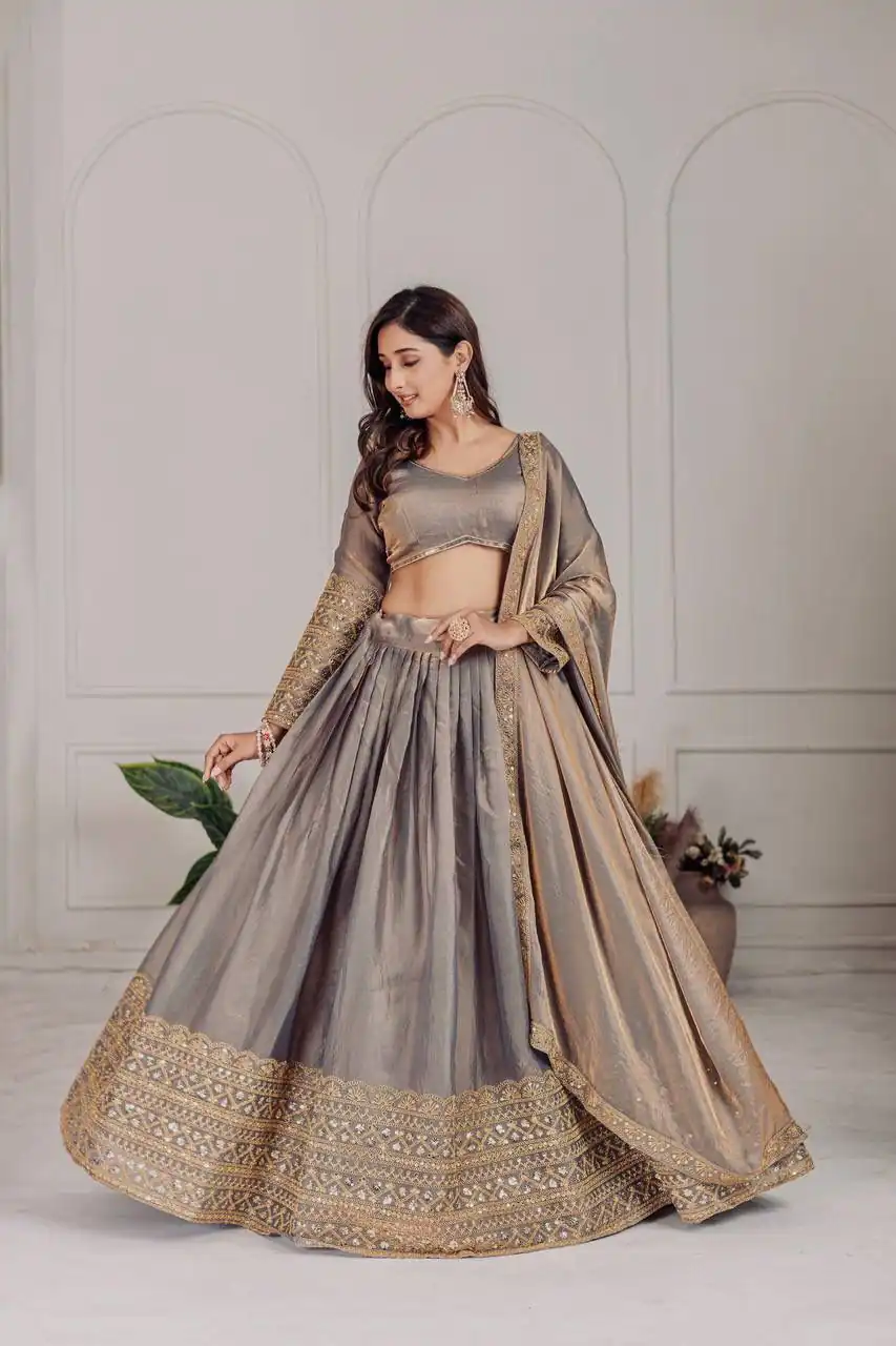 MT 1039 Grey Fendi Chiffon Lehenga Choli with Zari Work & Embroidery Work. Introductory Price ₹2599. Delivery 4-6 Working Days. Shop now. | Lehenga, Bollywood Lehenga, Creative Lehenga, Designer Lehenga, Embroidered Lehenga, Party Wear Lehenga