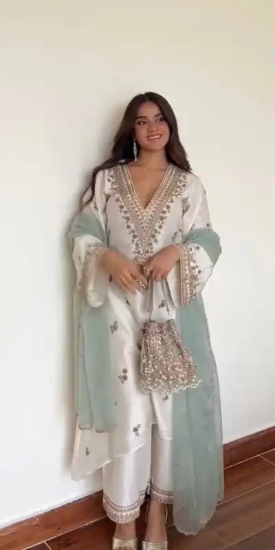 LG 2067 Off White Color Roman Silk Salwar Suit with Embroidery Work. Available at ₹1999 only. Delivery 4-6 Working Days. Shop now. | Jump Suits, Salwar suit, Casual Suits, Creative suits, Designer Suits, Palazzo Suits, Party Wear Suits, Patiala Suits, Straight Suits