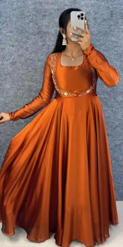 MF 888 Orange Rangoli Silk Gown with Lace Border & Lace Work. Available at ₹1649 only. Delivery 4-6 Working Days. Shop now. | Gowns, Bollywood Gowns, Creative Gowns, Designer Gowns, Embroidered Gowns, Party Wear Gowns