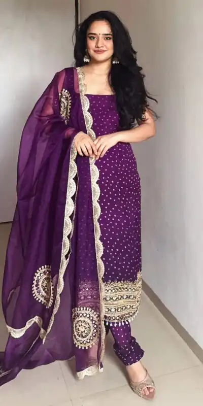 ST 1142 Purple Faux Georgette Salwar Suit with Mirror Work & Embroidery Work. Introductory Price ₹2449. Delivery 4-6 Working Days. Shop now. | Jump Suits, Salwar suit, Casual Suits, Creative suits, Designer Suits, Palazzo Suits, Party Wear Suits, Patiala Suits, Straight Suits
