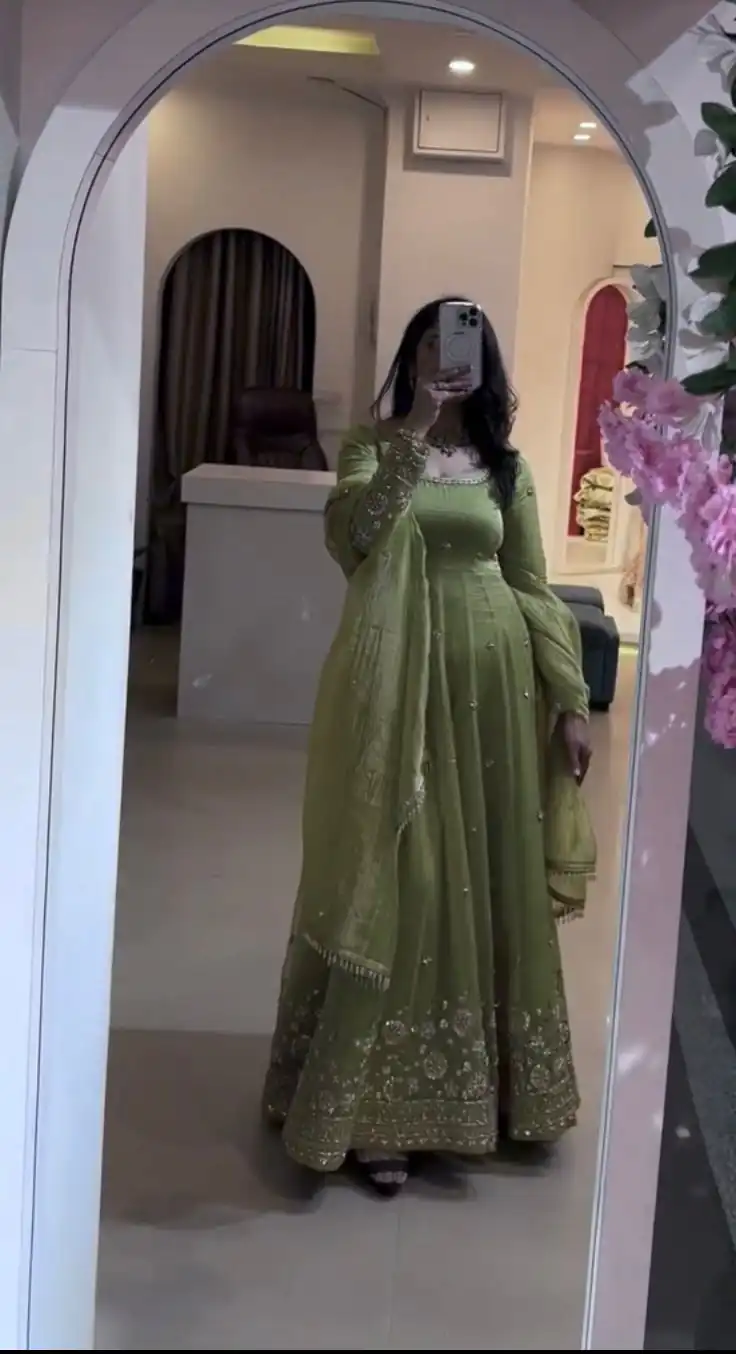 Elegant Parrot Green Crunchy Silk Embroidery Cut Work Gown