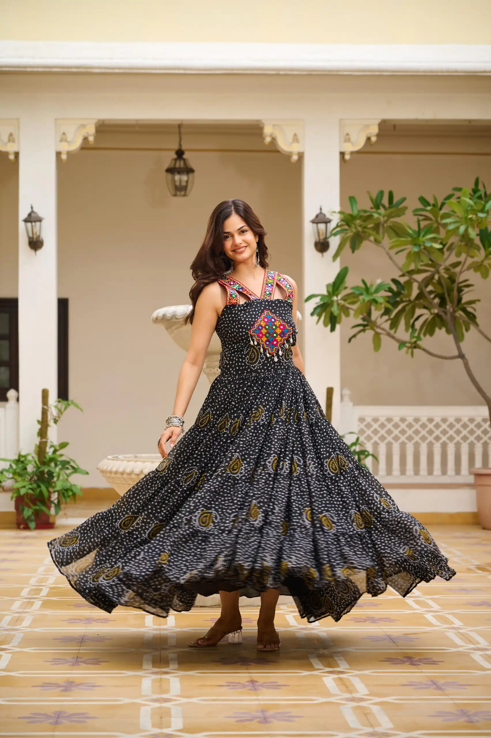 Graceful Black Georgette Bandhni Print Mirror Work Gown