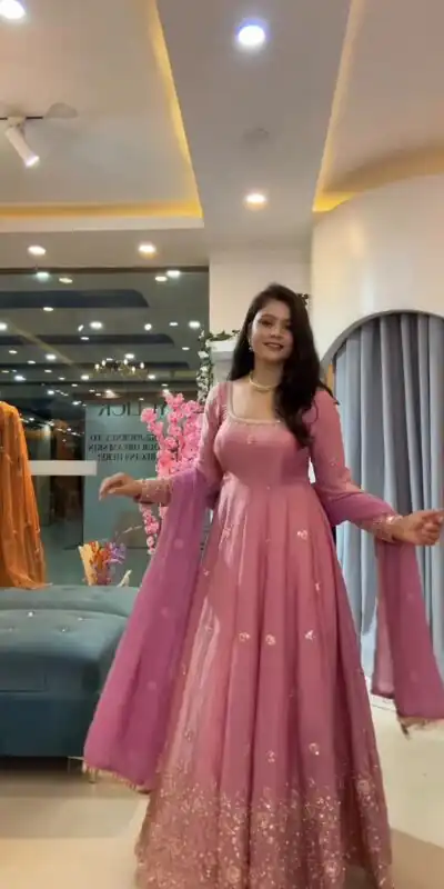 Glowing Peach Fendy Silk Sequins Thread Work Gown