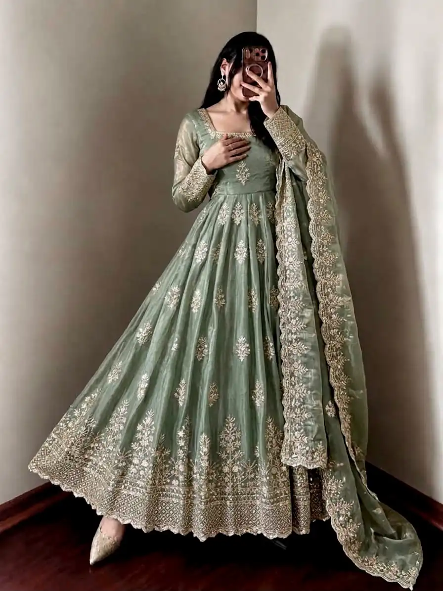 Trendy Pista Fendy Silk Embroidery Work Gown