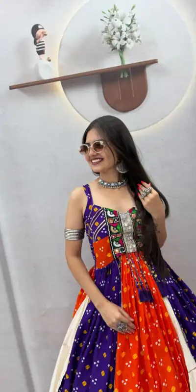 PC 604 Orange Khadi Cotton Lehenga Choli with Bandhej Print & Mirror Work. Festive Deal ₹3049. Delivery 4-6 Working Days. Shop now. | Lehenga, Bollywood Lehenga, Creative Lehenga, Designer Lehenga, Embroidered Lehenga, Party Wear Lehenga