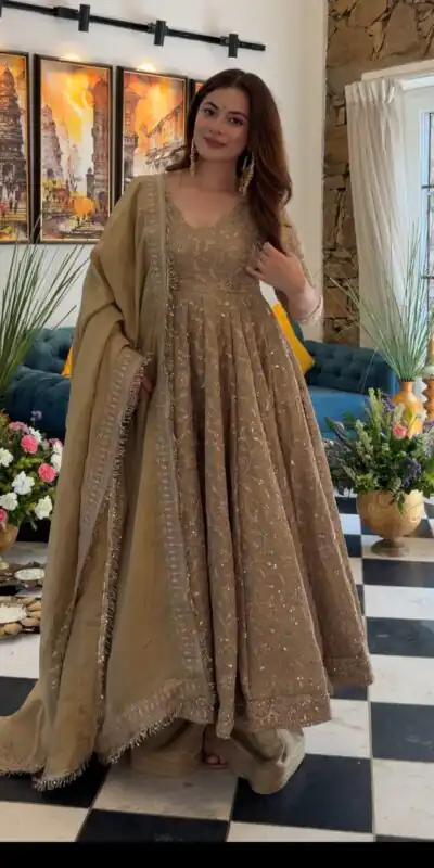 SR 1726 Chiku Fendy Silk Gown with Embroidery Work & Sequins Work. Special Price ₹2899. Delivery 4-6 Working Days. Shop now. | Gowns, Bollywood Gowns, Creative Gowns, Designer Gowns, Embroidered Gowns, Party Wear Gowns