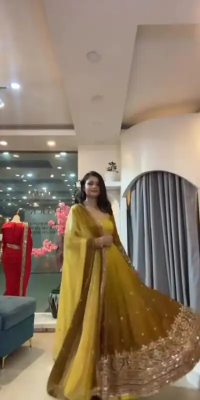 SR 1725 Yellow Faux Georgette Gown with Mirror Work & Embroidery Work. Get it for ₹2449. Delivery 4-6 Working Days. Online Shop now. | Gowns, Bollywood Gowns, Creative Gowns, Designer Gowns, Embroidered Gowns, Party Wear Gowns