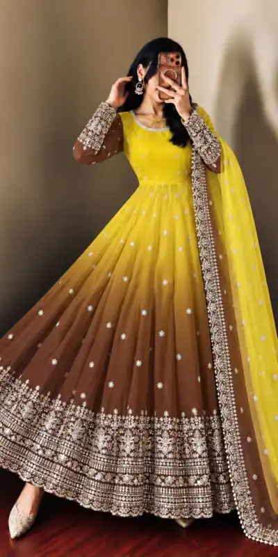 SR 1725 Yellow Faux Georgette Gown with Mirror Work & Embroidery Work. Get it for ₹2449. Delivery 4-6 Working Days. Online Shop now. | Gowns, Bollywood Gowns, Creative Gowns, Designer Gowns, Embroidered Gowns, Party Wear Gowns