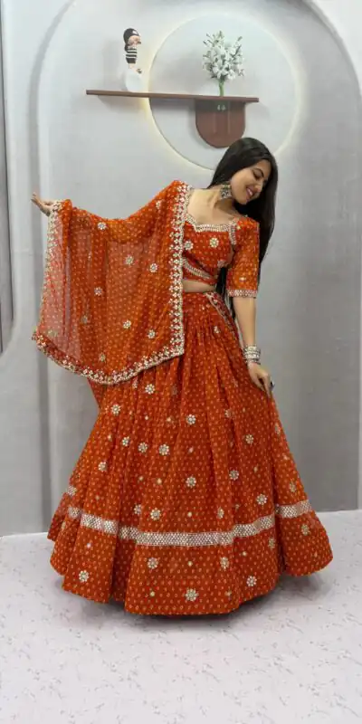 PC 602 Rust Faux Georgette Lehenga Choli with Embroidery Work & Lace Work. Special Price ₹3149. Delivery 4-6 Working Days. Shop now. | Lehenga, Bollywood Lehenga, Creative Lehenga, Designer Lehenga, Embroidered Lehenga, Party Wear Lehenga